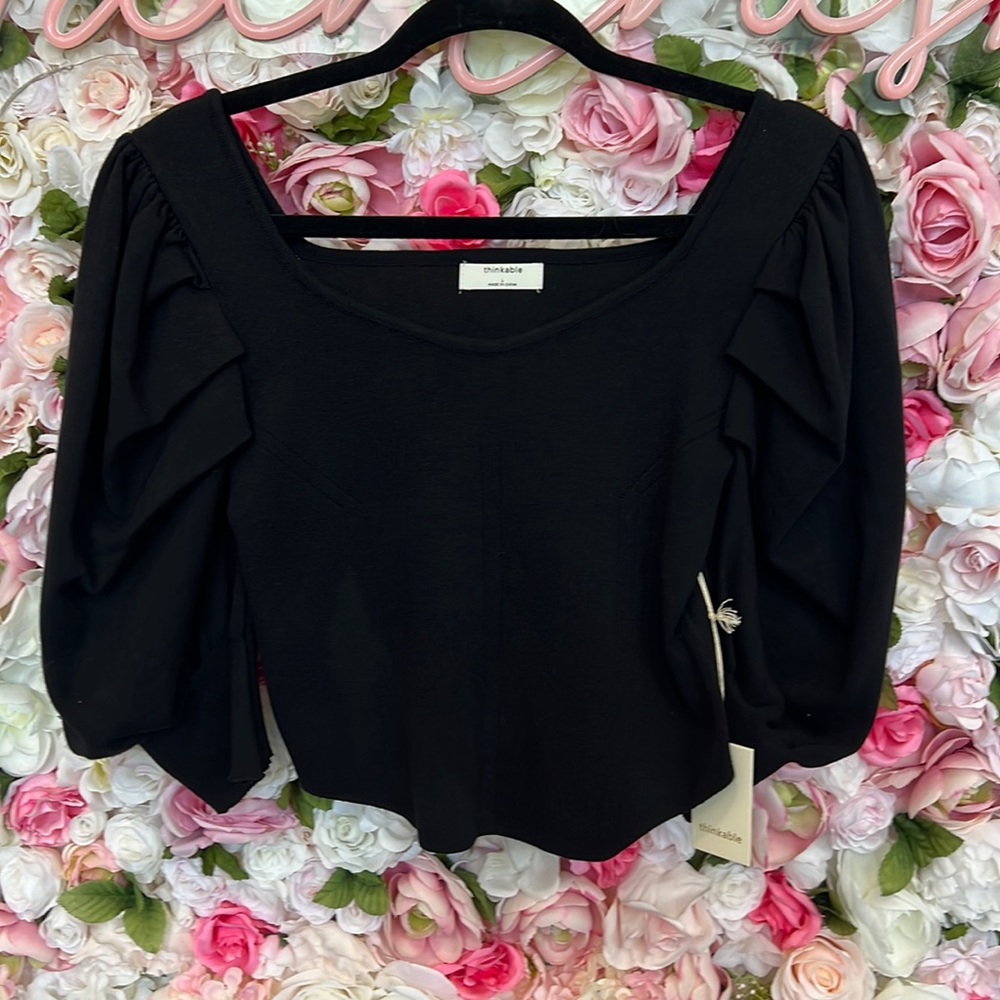 Thinkable black form fitting sweater